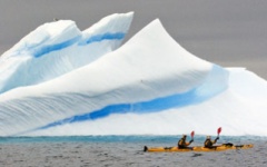 Kayaking next to huge glaciers